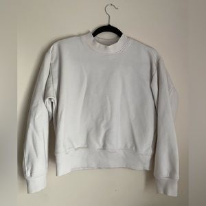 White crewneck sweater